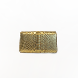 The Met Clutch in Gold